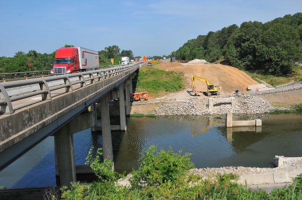 Work associated with bridges, overpasses and large drainage structures under the roadway can significantly increase the cost of repairing an Interstate highway.